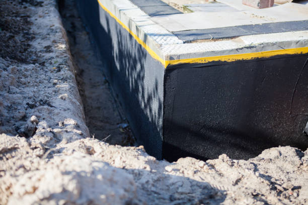 Professional Waterproofing technician working in Clayton, IN
